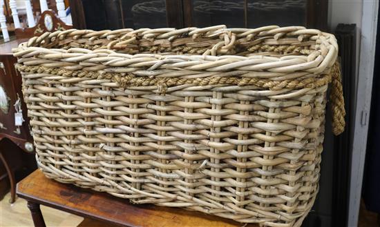 A three section wicker log basket W.107cm